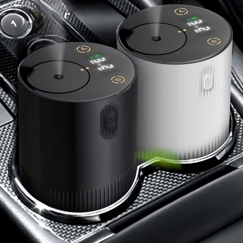 Black and white waterless diffusers sitting upright in a car cup holder
