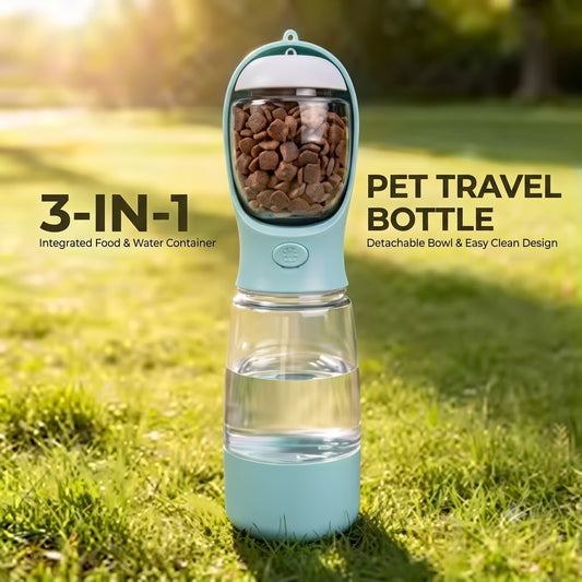 Mint 3-in-1 dog travel water bottle filled with kibble and water, standing on grass in a sunny park