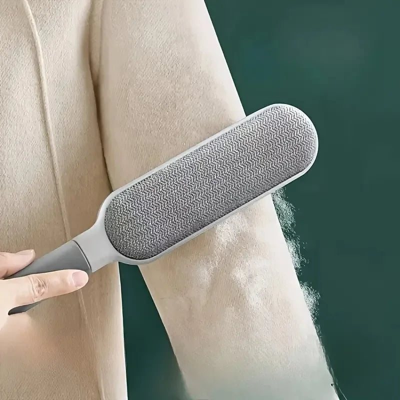 Reusable lint remover lifting hair off knitwear