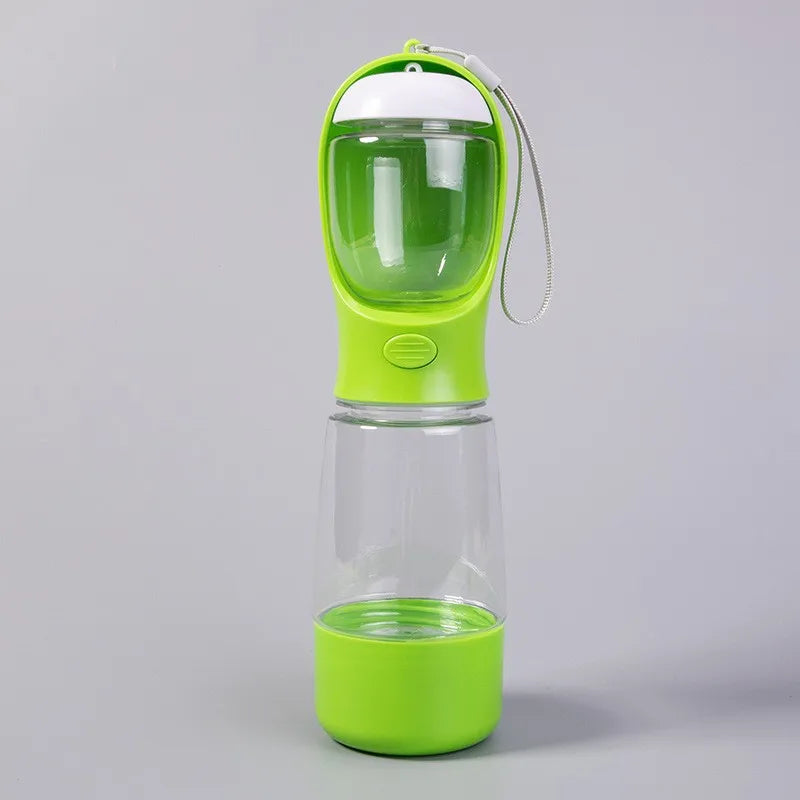 Green 3-in-1 dog travel water bottle with wrist strap, full front view