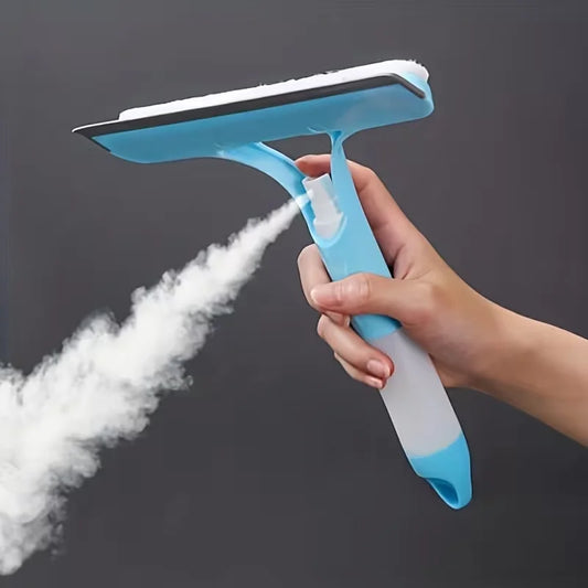 Spraying and wiping a kitchen hob surround with the 3-in-1 squeegee