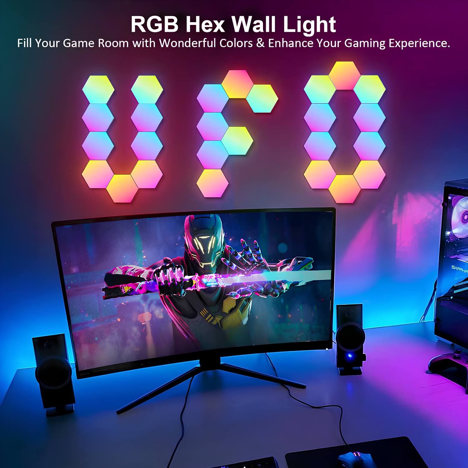 Hexagon panels arranged to spell a word above a gaming monitor and speakers